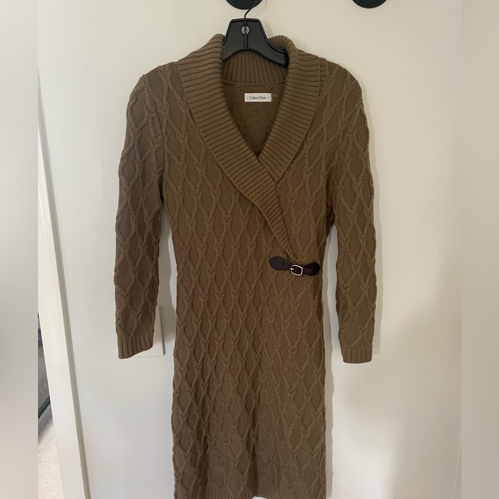 Calvin Klein sweater dress. Never worn! Very flattering!